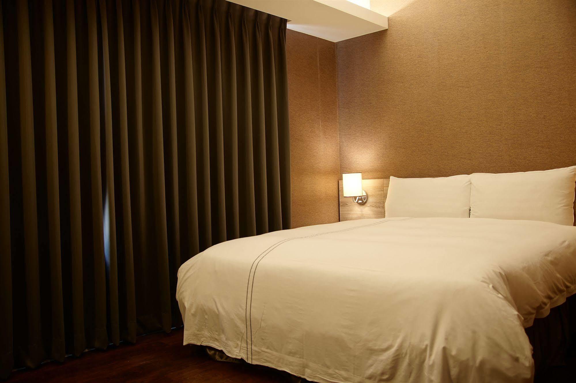 Talmud Business Hotel - Zhongshan Тайджун Екстериор снимка