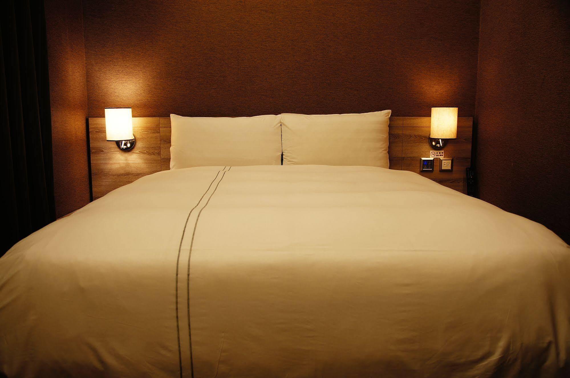 Talmud Business Hotel - Zhongshan Тайджун Екстериор снимка