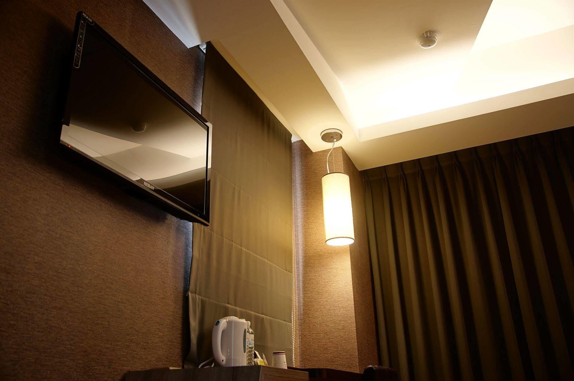 Talmud Business Hotel - Zhongshan Тайджун Екстериор снимка